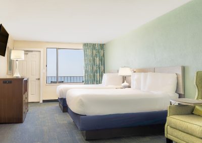 Bright hotel room with ocean view